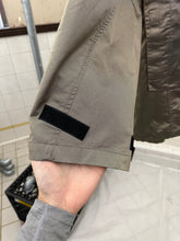 Load image into Gallery viewer, 2000s Levis Engineered Jeans Chemical Hood Metallic Jacket in Metallic Gold - Size L