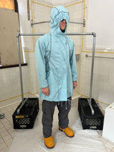 Load image into Gallery viewer, ss2004 Issey Miyake Light Blue Bungee Cord Long Raincoat - Size M