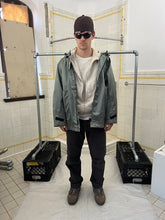 Load image into Gallery viewer, 2000s Levis Engineered Jeans Chemical Hood Metallic Jacket in Silver Blue - Size L