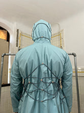Load image into Gallery viewer, ss2004 Issey Miyake Light Blue Bungee Cord Long Raincoat - Size M