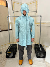 Load image into Gallery viewer, ss2004 Issey Miyake Light Blue Bungee Cord Long Raincoat - Size M