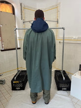 Load image into Gallery viewer, 1980s Issey Miyake Aqua Polyurethane Coated Cotton Squid Coat - Size M/L