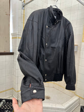 Load image into Gallery viewer, 1980s Claude Montana Leather Jacket with Back Emblem and Shoulderpads - Size XL