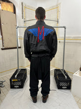 Load image into Gallery viewer, 1980s Claude Montana Leather Jacket with Back Emblem and Shoulderpads - Size XL