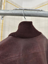 Load image into Gallery viewer, 1980s Marithe Francois Girbaud x Compagnie Des Montagnes &amp; Des Forets Padded Leather Jacket with High Ribbed Neck - Size M