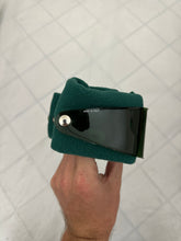 Load image into Gallery viewer, 1980s Vintage Baruffaldi Green Headband with Built-in Shades - Size OS