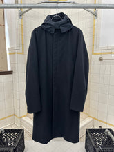 Load image into Gallery viewer, 2000s Burberry Prorsum Black Wool Trench Coat with Packable Hood and Waist Cinch - Size M
