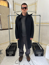 Load image into Gallery viewer, 2000s Burberry Prorsum Black Wool Trench Coat with Packable Hood and Waist Cinch - Size M