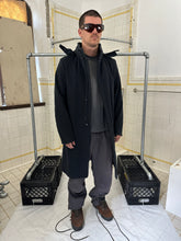 Load image into Gallery viewer, 2000s Burberry Prorsum Black Wool Trench Coat with Packable Hood and Waist Cinch - Size M