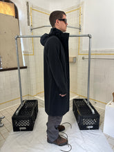 Load image into Gallery viewer, 2000s Burberry Prorsum Black Wool Trench Coat with Packable Hood and Waist Cinch - Size M