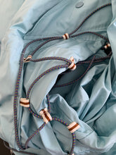 Load image into Gallery viewer, ss2004 Issey Miyake Light Blue Bungee Cord Long Raincoat - Size M