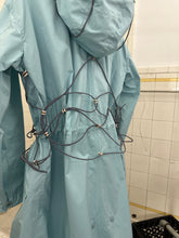 Load image into Gallery viewer, ss2004 Issey Miyake Light Blue Bungee Cord Long Raincoat - Size M