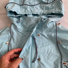 Load image into Gallery viewer, ss2004 Issey Miyake Light Blue Bungee Cord Long Raincoat - Size M