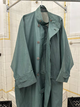 Load image into Gallery viewer, 1980s Issey Miyake Aqua Polyurethane Coated Cotton Squid Coat - Size M/L