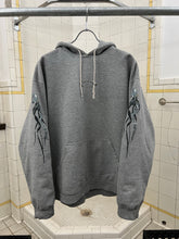 Load image into Gallery viewer, 2000s Oakley Futuristic Squid Graphic Hoodie - Size L