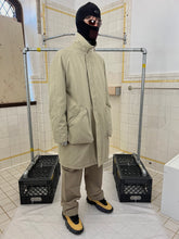 Load image into Gallery viewer, Late 1990s Mandarina Duck Egg Cell Padded High Neck Trench - Size L