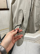 Load image into Gallery viewer, 2000s Samsonite 'Travel Wear' Khaki Hooded Windbreaker - Size L