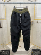 Load image into Gallery viewer, 1990s Vintage Destroy Olive Two-Tone Nylon Cotton Sweatpants - Size L