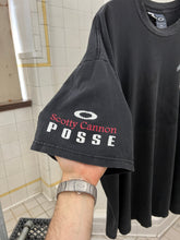 Load image into Gallery viewer, 2000s Oakley Software ‘Scotty Cannon’ Mascot Print Tee - Size XL