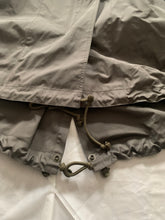Load image into Gallery viewer, ss2004 Issey Miyake Military Khaki Bungee Cord Long Raincoat - Size M
