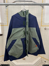 Load image into Gallery viewer, 1990s Mickey Brazil Colorblock Rain Jacket - Size L