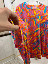 Load image into Gallery viewer, 1980s Katharine Hamnett Festive Print Logo Tee - Size L