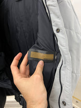 Load image into Gallery viewer, 2000s Samsonite 'Travel Wear' Glacier Blue Puffer Jacket - Size XL