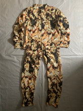 Load image into Gallery viewer, aw2010 Issey Miyake Articulated Twist Knee Nylon Lava Graphic Pants - Size L