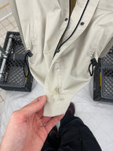 Load image into Gallery viewer, 2000s Samsonite 'Travel Wear' Khaki Hooded Windbreaker - Size L