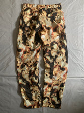 Load image into Gallery viewer, aw2010 Issey Miyake Articulated Twist Knee Nylon Lava Graphic Pants - Size L