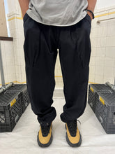 Load image into Gallery viewer, 1980s Marithe Francois Girbaud Black Paneled Trousers with Adjustable Synch Hem Detail - Size L