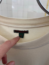 Load image into Gallery viewer, 1990s Katharine Hamnett Faded Tan Logo Tee - Size XL
