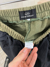 Load image into Gallery viewer, 1990s Vintage Destroy Olive Two-Tone Nylon Cotton Sweatpants - Size L