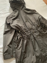 Load image into Gallery viewer, ss2004 Issey Miyake Military Khaki Bungee Cord Long Raincoat - Size M