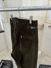 Load image into Gallery viewer, 1980s Katharine Hamnett Olive Corduroy Baggy Trousers with Waist Synch and Tapered Cuff - Size M