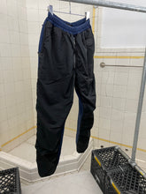 Load image into Gallery viewer, 1990s Vintage Destroy Navy Two-Tone Nylon Cotton Sweatpants - Size L