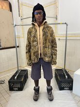 Load image into Gallery viewer, 2000s Griffin Wetlands Camo Combat Jacket with Back Pouch Pocket - Size L