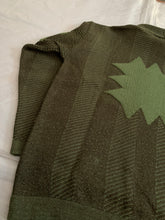 Load image into Gallery viewer, 1980s Issey Miyake Green Wool Turtleneck Sweater with Embossed Graphic - Size L