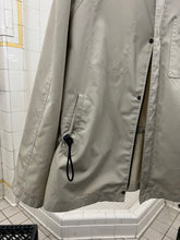 Load image into Gallery viewer, 2000s Samsonite 'Travel Wear' Khaki Hooded Windbreaker - Size L