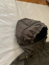 Load image into Gallery viewer, ss2004 Issey Miyake Military Khaki Bungee Cord Long Raincoat - Size M