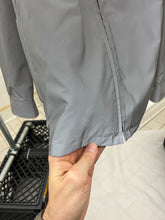 Load image into Gallery viewer, 2000s Samsonite 'Travel Wear' Reflective Glass Jacket - Size XL