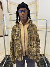 Load image into Gallery viewer, 2000s Griffin Wetlands Camo Combat Jacket with Back Pouch Pocket - Size L