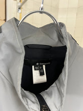 Load image into Gallery viewer, 2000s Samsonite 'Travel Wear' Reflective Glass Jacket - Size XL