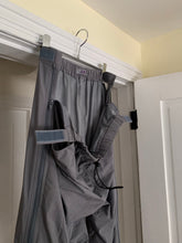 Load image into Gallery viewer, 1990s Lad Musician Gunmetal Full Side Zip Nylon Pants - Size OS