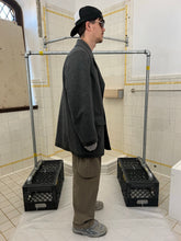 Load image into Gallery viewer, Late 1990s Mandarina Duck Rubberized Cuff and Hem Peacoat - Size L