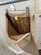 Load image into Gallery viewer, 2000s Mandarina Duck Beige Leather Skirt with Contrasting Mesh Detailing - Size XS