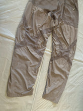 Load image into Gallery viewer, ss2005 Issey Miyake Soft Blush Twist Calf Paneled Technical Pants - Size M