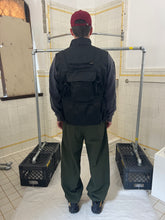 Load image into Gallery viewer, 2000s Samsonite ‘Travel Wear’ Paneled Vest with Packable Backpack - Size L