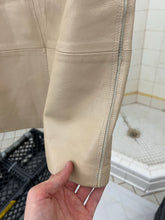 Load image into Gallery viewer, 2000s Mandarina Duck Beige Leather Skirt with Contrasting Mesh Detailing - Size XS