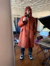 Load image into Gallery viewer, aw1994 Issey Miyake Translucent Burnt Orange Oversize Long Coat with Packable Hood - Size L